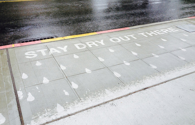 Illustrations on Sidewalks Appear When Raining