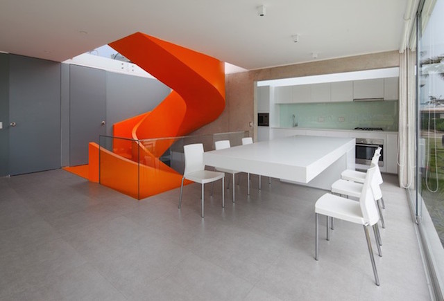 Flashy Orange Staircase in Modern Home-7