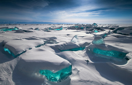 Turquoise Ice Gems Emerging From Russian Lake