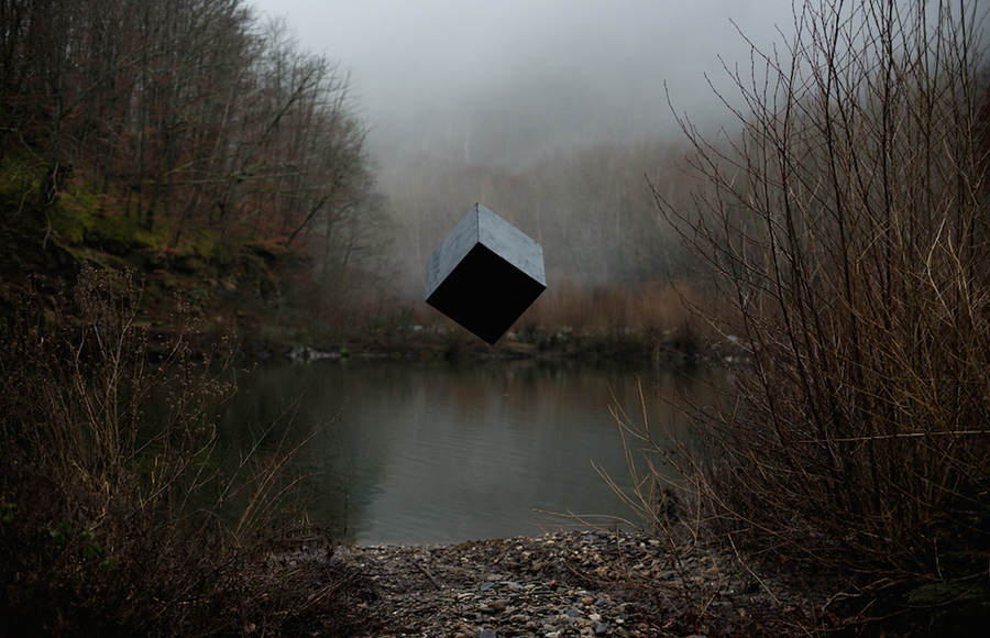 A Black Cube Floating in Nature