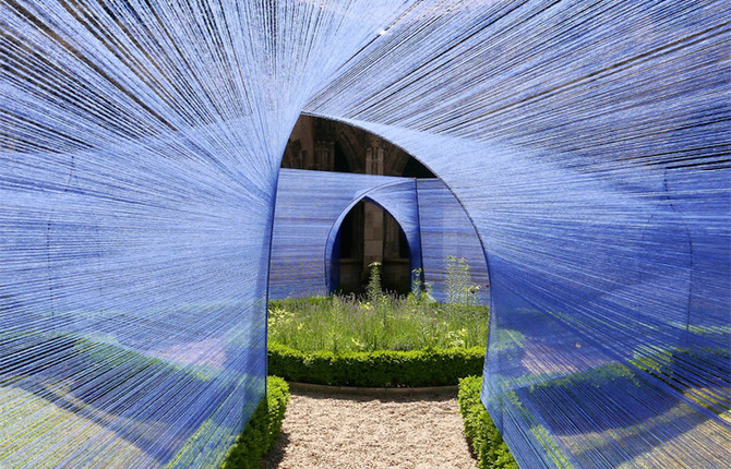 Blue Strings Tunnels in a Gothic Cloister Garden