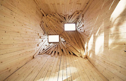 Wooden Deep Cave Installation Made with Planks