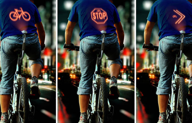 Bicycle Device Showing Illuminated Signals On Cyclist’s Back