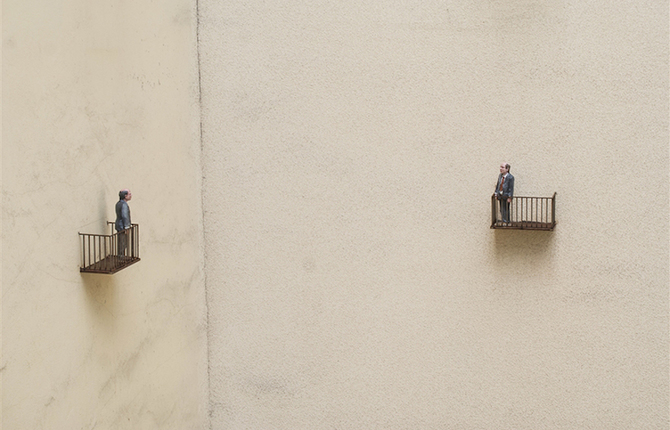 Miniature Cages-like Balconies Attached to a Building