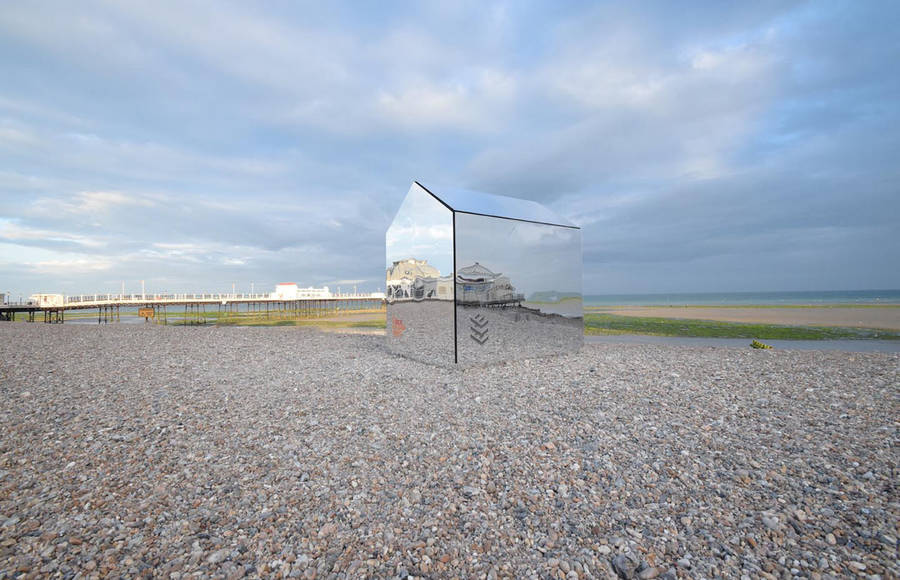A Mirrored Hut on a Beach