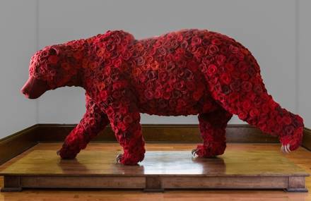 A Bear Sculpture Made of Fake Roses