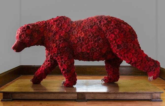 A Bear Sculpture Made of Fake Roses