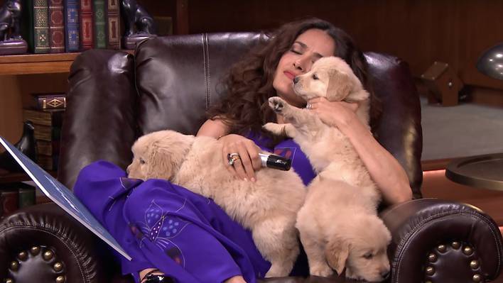 Salma Hayek Cuddling Puppies
