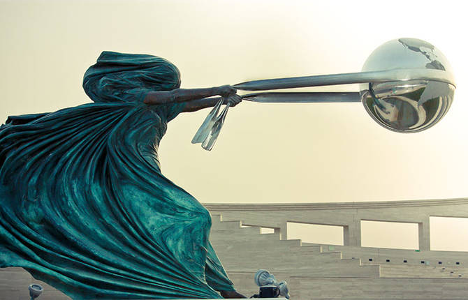 Sculpture of Mother Nature Rotating Earth