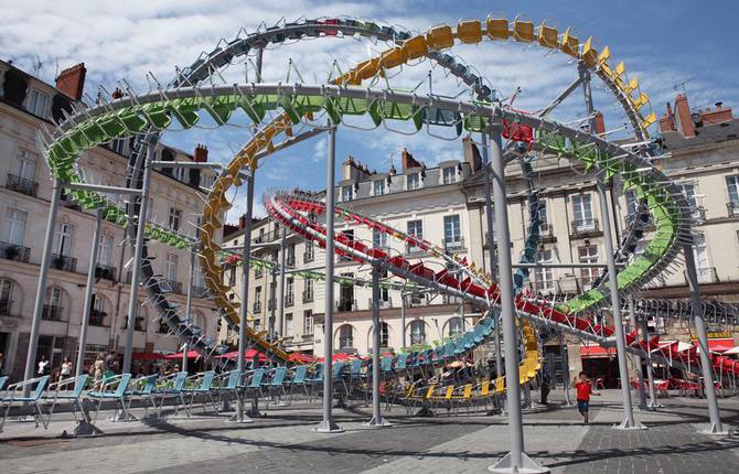 Hundreds of Colorful Café Chairs Turned into Roller Coaster