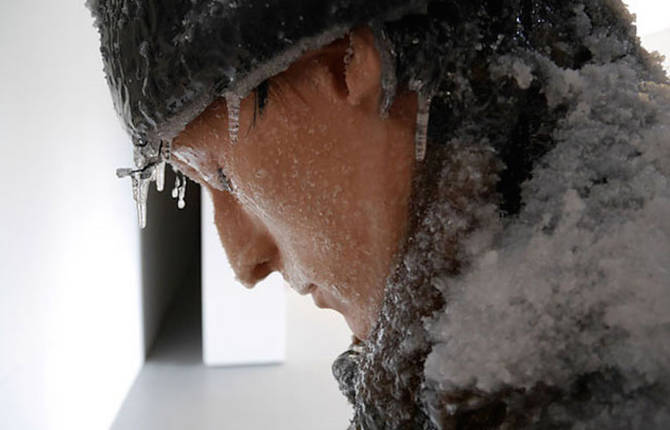 Frozen Man Alongside Icy Painting
