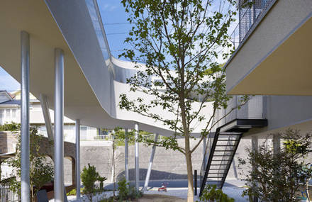 Elevated House With an Underneath Garden