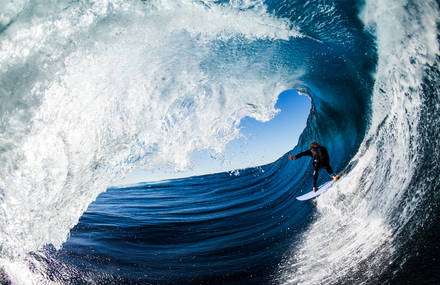 Surfers Inside Barrel Waves