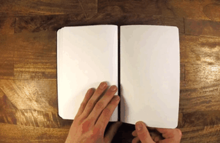 Notebook With Magnetic Spine to Remove And Reattach Pages