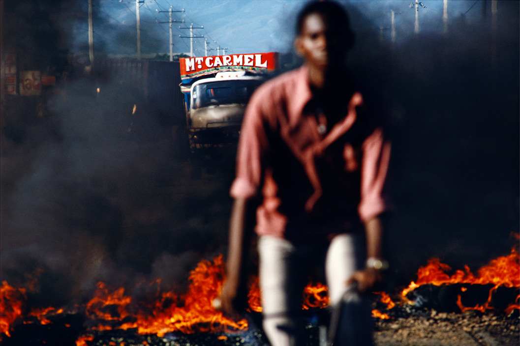 HAITI. Port-au-Prince. 1987. Fires set by anti-election provocateurs.