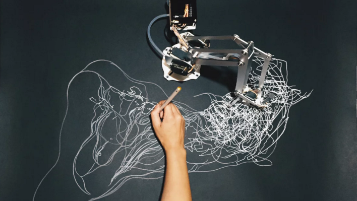 Robotic Arm and Artist Drawing Together