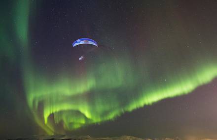 Paragliding under Auroras Borealis