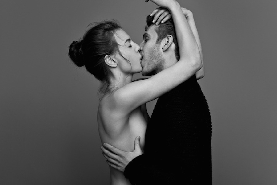 People Passionately Kissing.