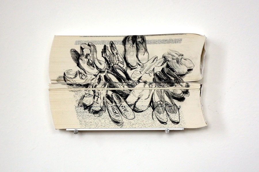 Inventive Pencil Drawings on the Edge of Books 1