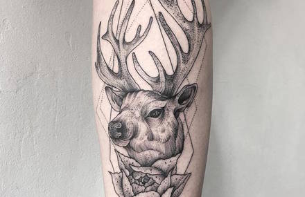 Fantastical Creatures Emerging from Blackwork Tattoos