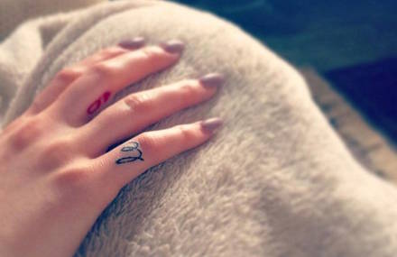 Tiny Finger Tattoos