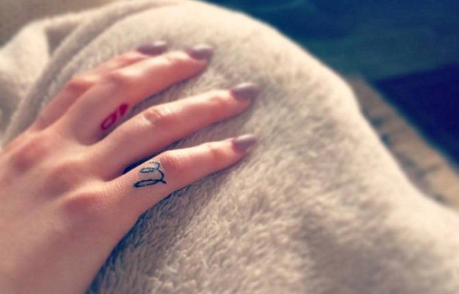 Tiny Finger Tattoos