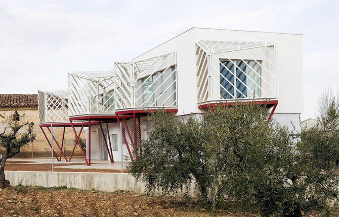 Architect House with a Geometric Balcony and Facade