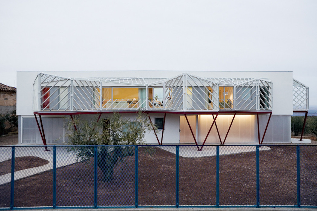 Architect House with a Geometric Balcony and Facade-7