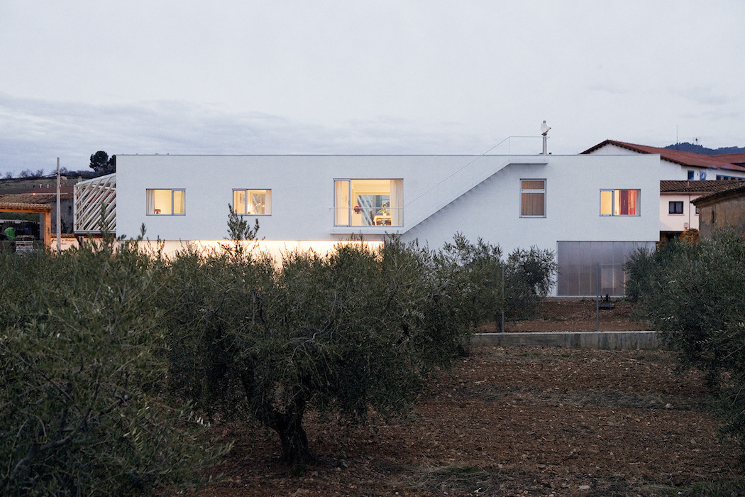 Architect House with a Geometric Balcony and Facade-8