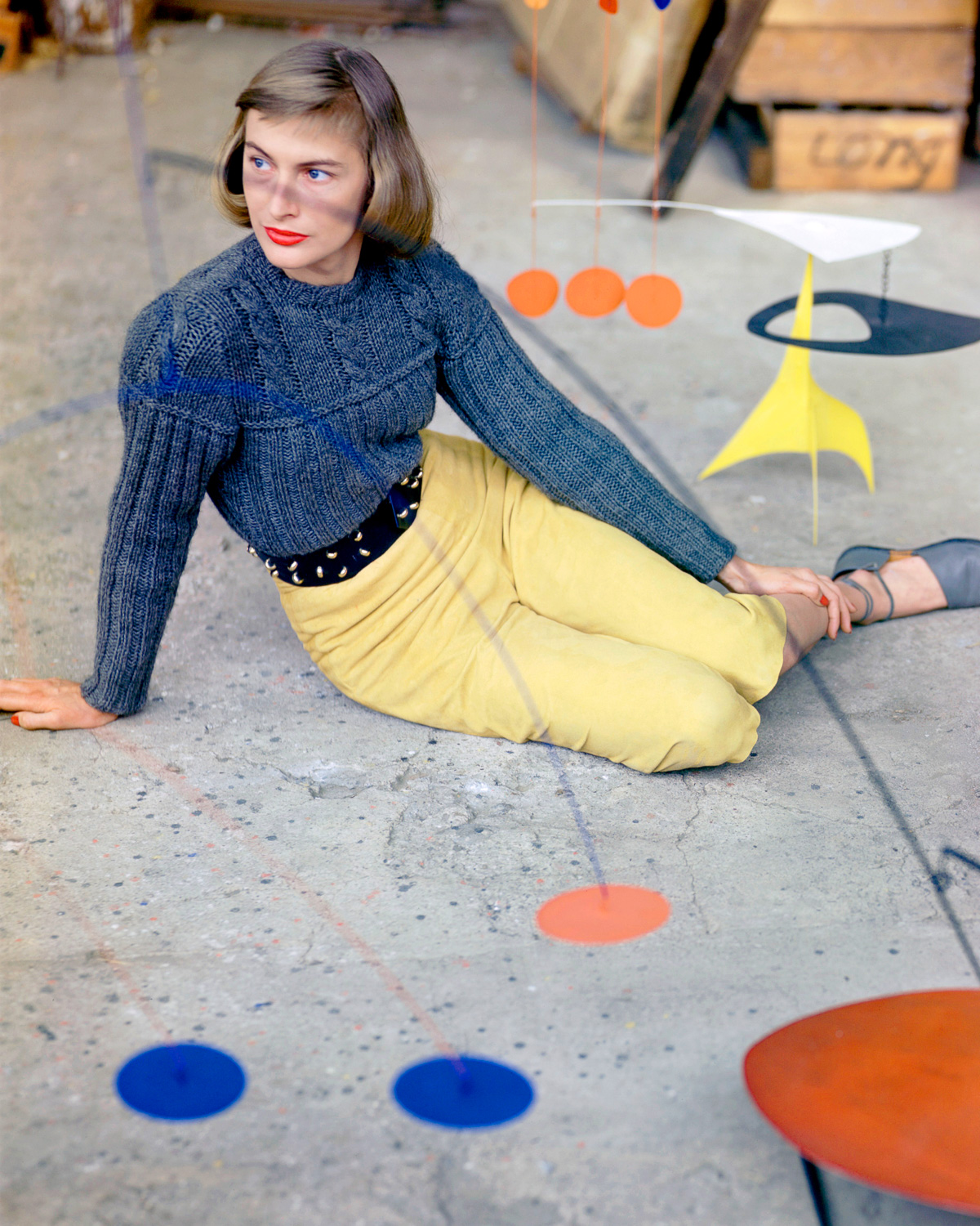 Model Posing with Mobile in Calder's Studio