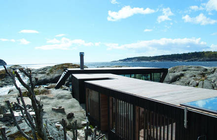 Glass-Walled Home in the Rocks of Norway