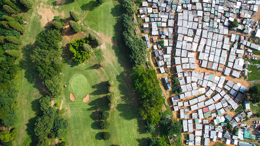 Striking Aerial Pictures of Limits Between Rich and Poor1