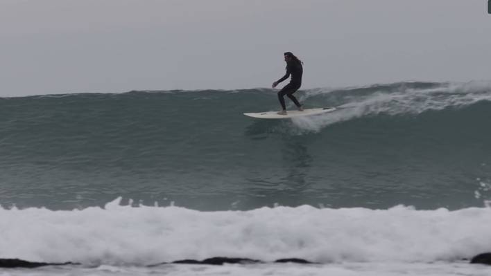 Poetic Communion Between Surfers and the Sea