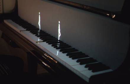 Spectral Animated Characters Playing Piano with their Footsteps
