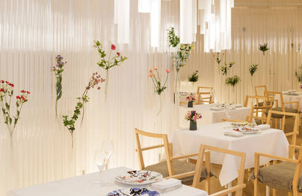 Amazing Restaurant Featuring Walls of Flowers & Transparent Tubes