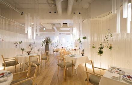 Amazing Restaurant Featuring Walls of Flowers & Transparent Tubes