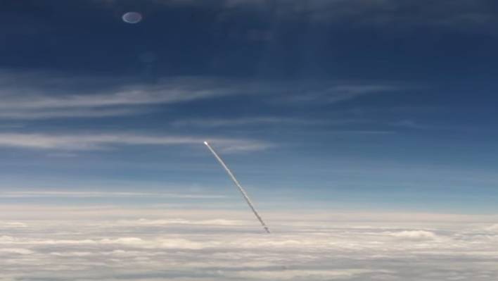 A Space Shuttle Launch Seen From a Plane
