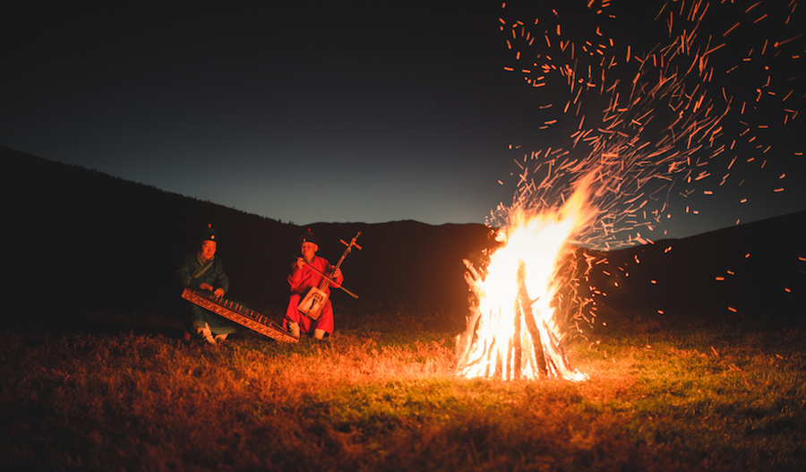Musicians By The Camp Fire