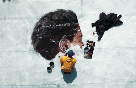 Giant Portraits of a Woman on Ice