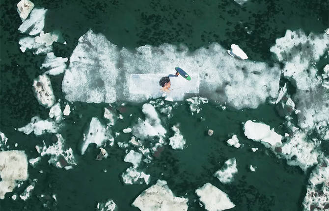 Giant Portraits of a Woman on Ice