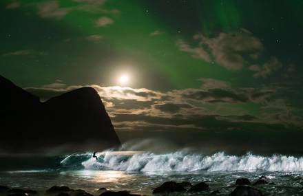Surfing Under an Aurora Borealis in Norway with Mick Fanning