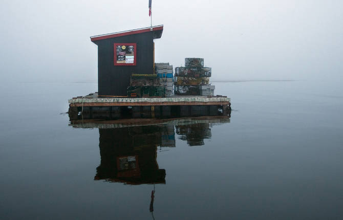 Peaceful Pictures of Fishing Houses on Water