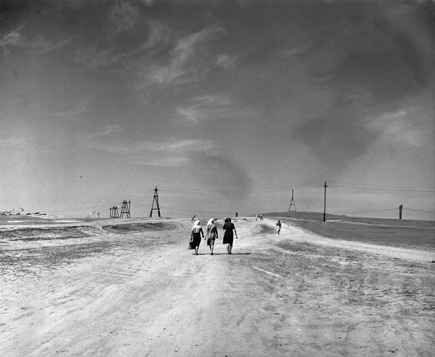 USSR. Stalingrad. 1947. Women walking in a deserted landscape.