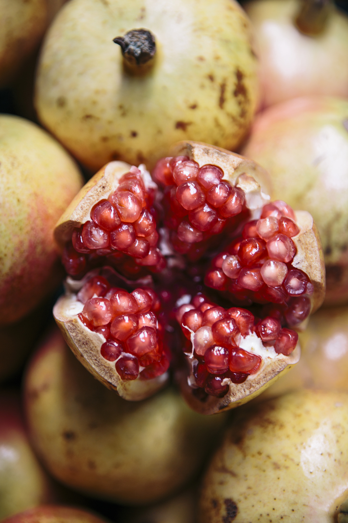 Pomegranates for sale at a street food stall, Chinatown, Bangkok, Thailand