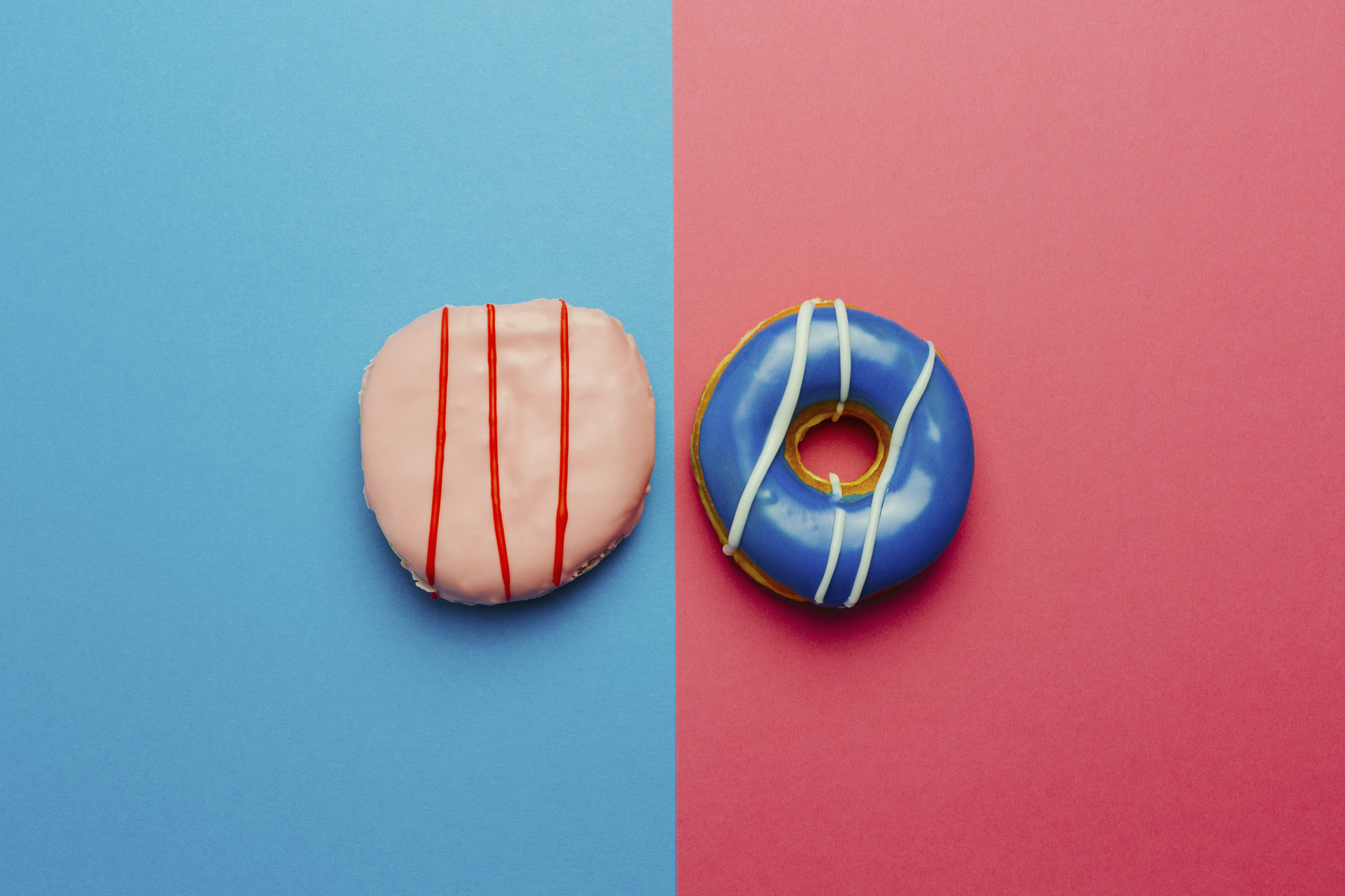 Directly above shot of donuts on colored background