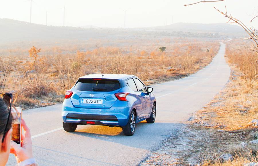 Under the Blue Sky of Croatia with a Blue Car