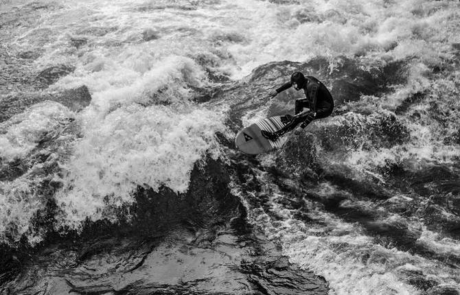 Black and White Photographs of Surfers in Munich