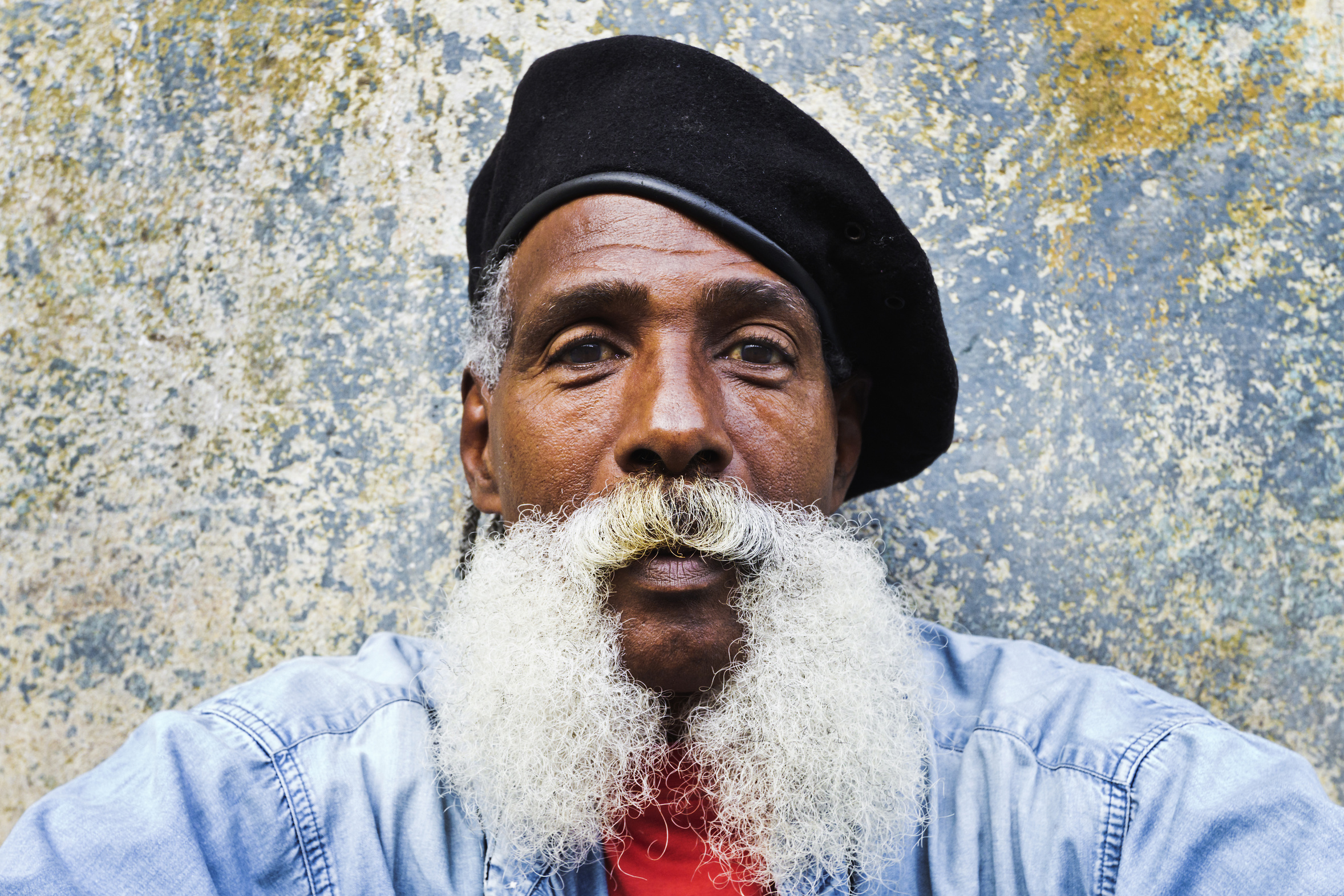 Bearded man in Cuban cap