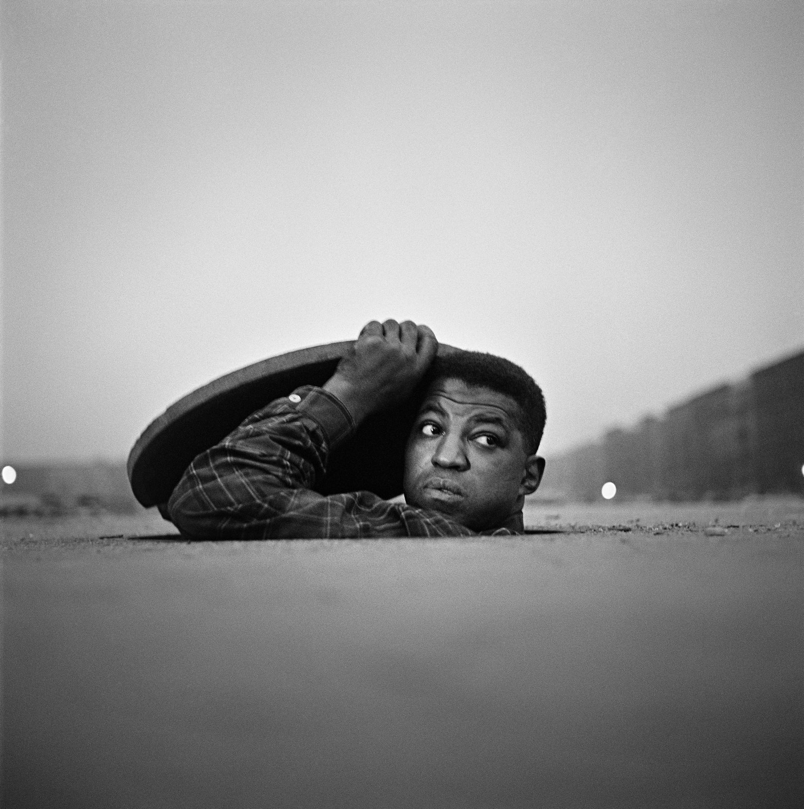 The Invisible Man, Harlem, New York, 1052 Photograph by Gordon Parks. Courtesy of and copyright The Gordon Parks Foundation