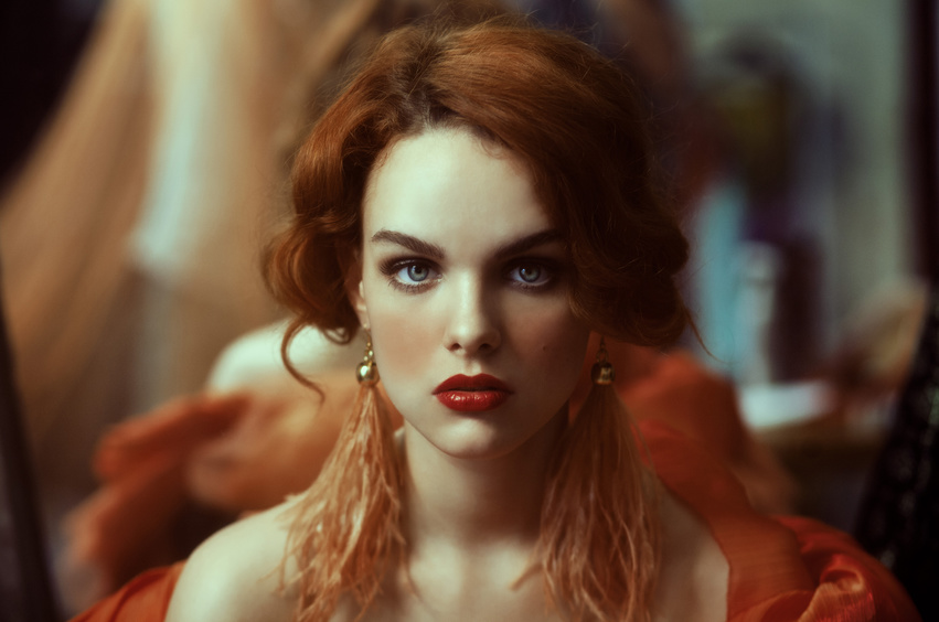 Woman with red hair and lipstick portrait